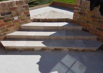Exterior screeding, tiling to patio with steps (10)