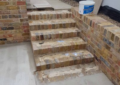 Exterior screeding, tiling to patio with steps (2)