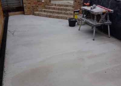 Exterior screeding, tiling to patio with steps (3)