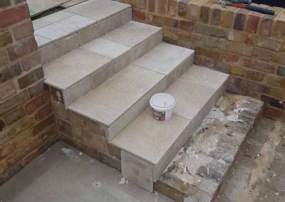 Exterior screeding, tiling to patio with steps (5)