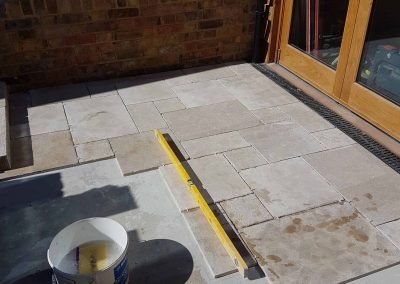 Exterior screeding, tiling to patio with steps (8)