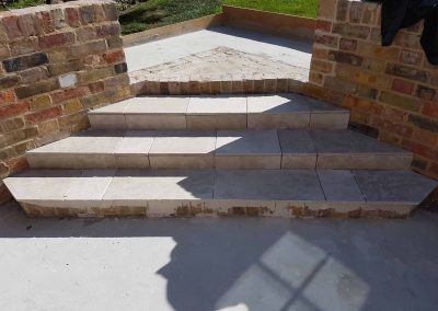 Exterior screeding, tiling to patio with steps (9)